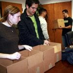 Students prepared 4 identical boxes to be sent to each destination.